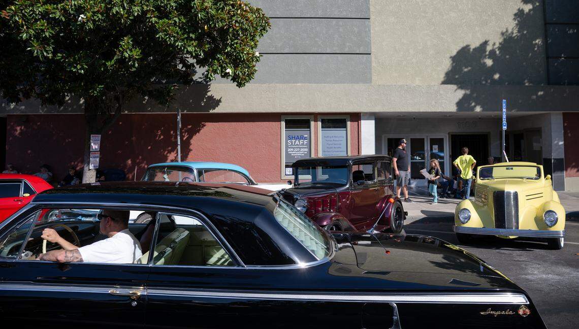 Classic cars line the streets of downtown Modesto during the Legends of the Cruise Park N’ Shine Wednesday, June 4, 2025.