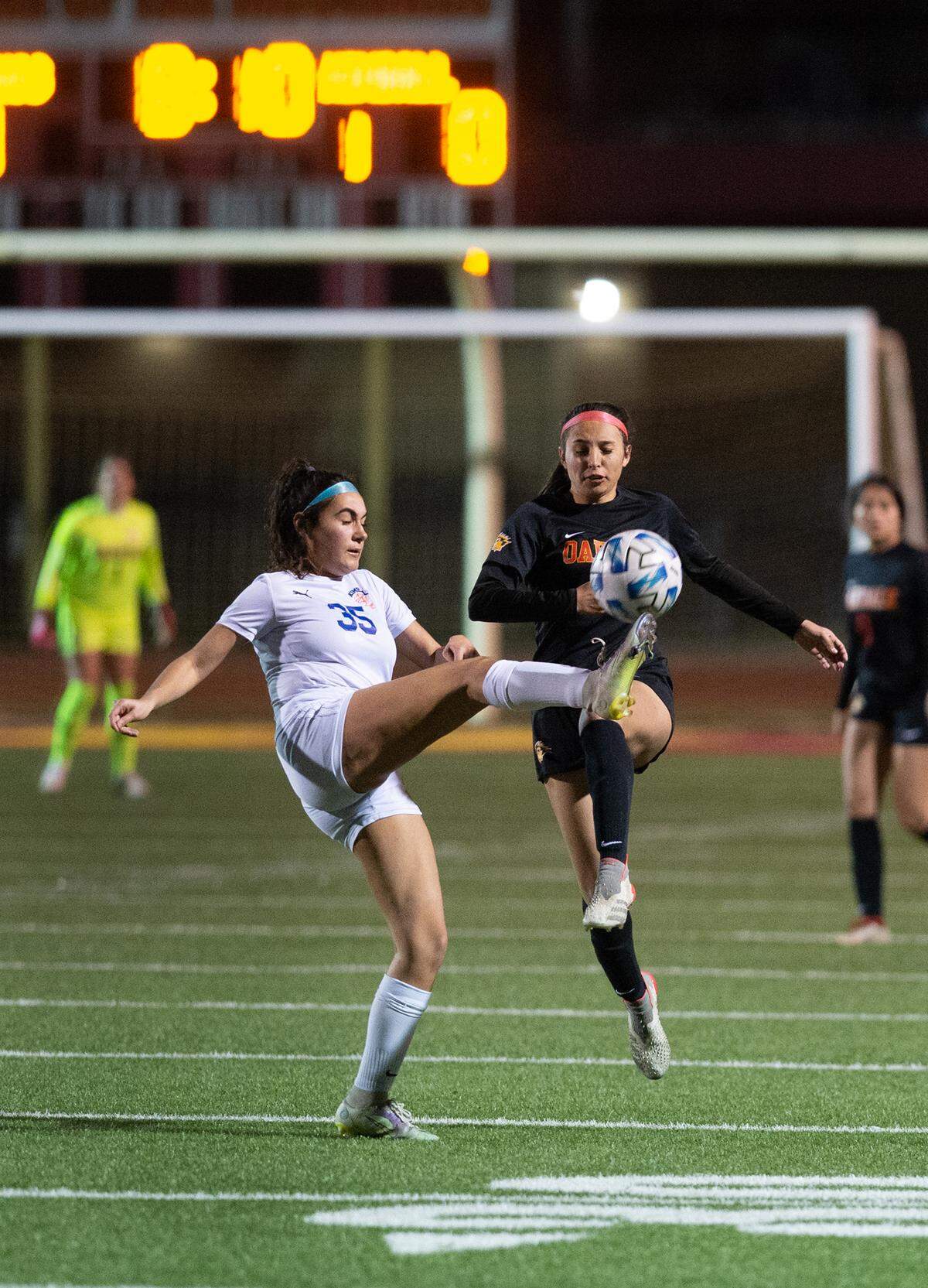 Oakdale’s Alondra Vigil, right, defends on Kimball’s Emily Chacon during the Valley Oak League game in Oakdale, Calif., Friday, Jan. 20, 2023. Oakdale won the game 2-1.