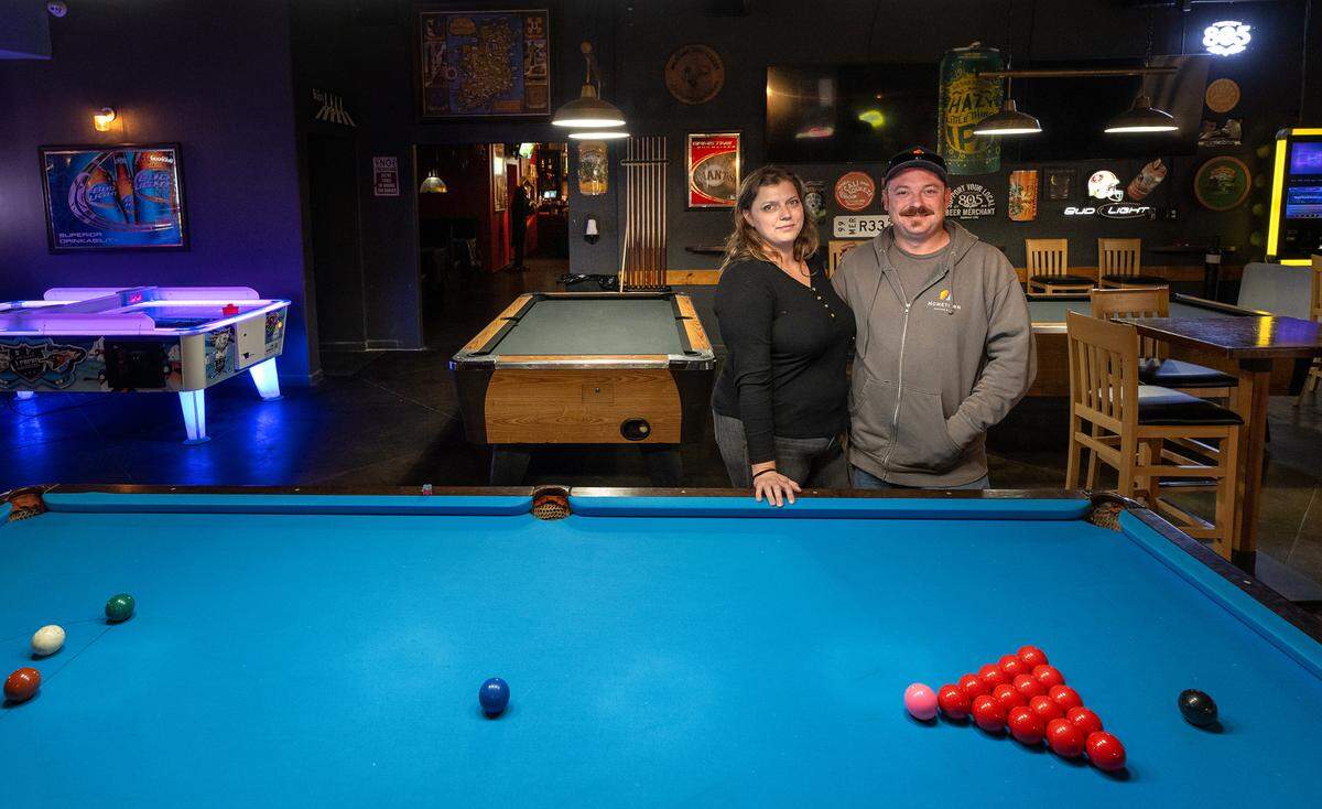 Jill and Ryan Irons have opened The Goat bar & grill with business partners Justin Diaz and Les Knoll (not pictured), the new space features a game room and live music. The Goat takes over on 10th Street in the former Ralston’s Goat spot. Photographed in Modesto, Calif., Thursday, Oct. 26, 2023.