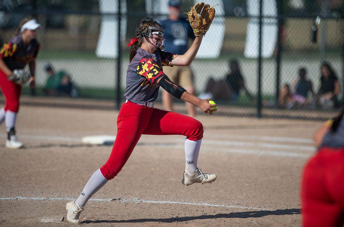 Oakdale pitcher Raegen Everett throws to a Central Catholic batter during during the CIF Sac-Joaquin Section Softball semifinal playoff game at Central Catholic High School in Modesto Calif., on Tuesday, May 24, 2022.