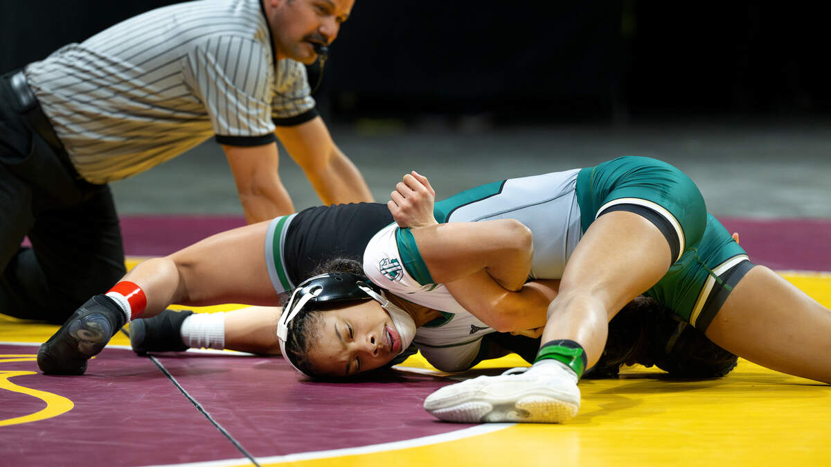 Grace Davis’ Jazmine Turner pinned Lauren Catiis from Twelve Bridges in the 105-pound title match during the Sac-Joaquin Section Masters Wrestling championships at Adventist Health Arena in Stockton, Saturday, Feb. 22, 2025.