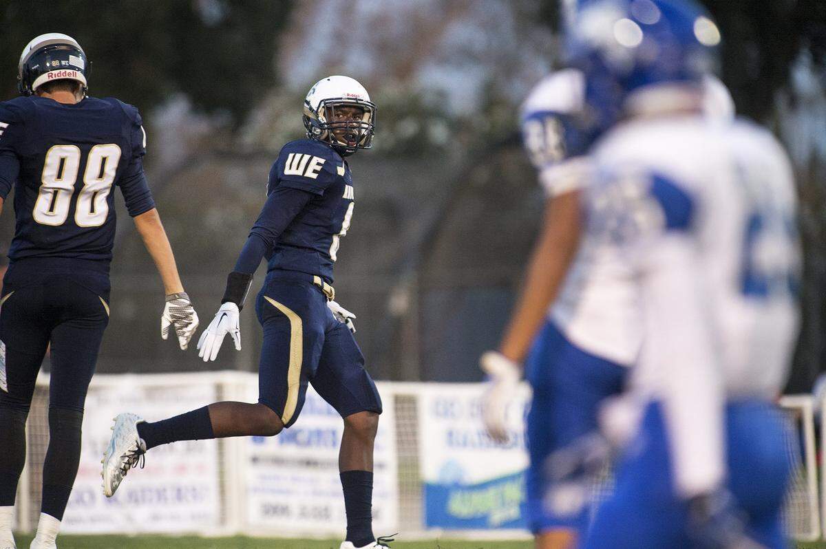 Central Catholic receiver DaRon Bland runs off the field after making a 64-yard touchdown reception during a nonconference game with Atwater in Modesto, Calif., on Friday, September, 4, 2015. Central Catholic won the game 49-0.