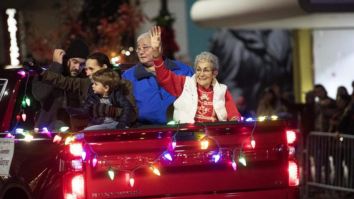Modesto councilwoman Jenny Kenoyer waves to the crowd during the Celebration of Lights Parade in Modesto, Calif., Saturday, Dec. 7, 2019.