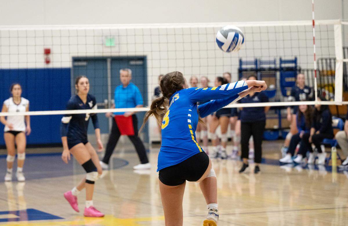Ripon Christian’s Anneke Dyt returns a ball during the Sac-Joaquin Section Division III quarterfinal playoff match with Central Catholic at Ripon Christian High School in Ripon, Thursday, Oct. 31, 2024.