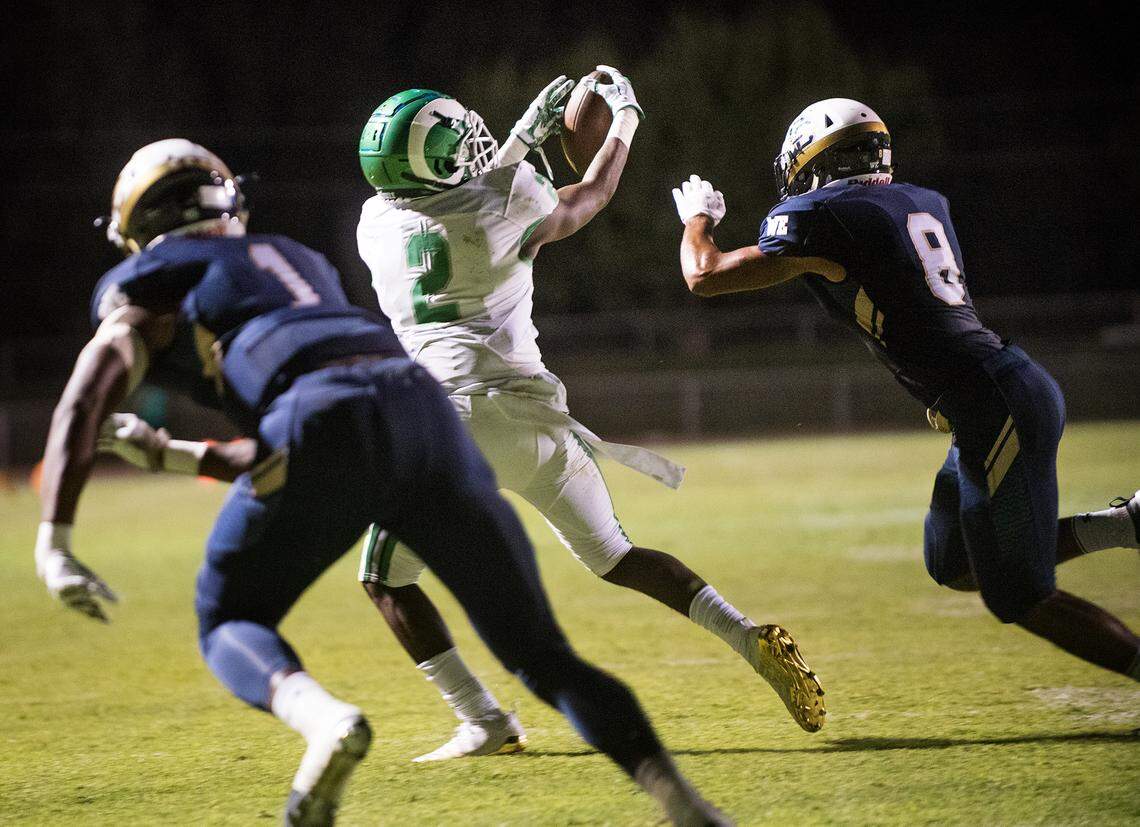 St. Mary’s Asar-alim Moore makes a catch near the end zone in the first half of the Holy Bowl game with Central Catholic at Central Catholic High School in Modesto , Calif., August 31, 2018. 