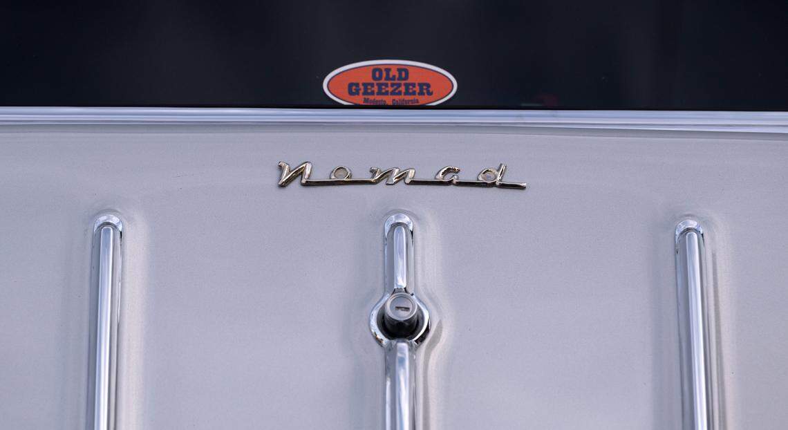 Classic car owners cruise down McHenry Avenue during the Graffiti Parade in Modesto, Calif., Friday, June 9, 2023.