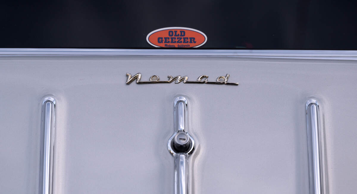 Classic car owners cruise down McHenry Avenue during the Graffiti Parade in Modesto, Calif., Friday, June 9, 2023.