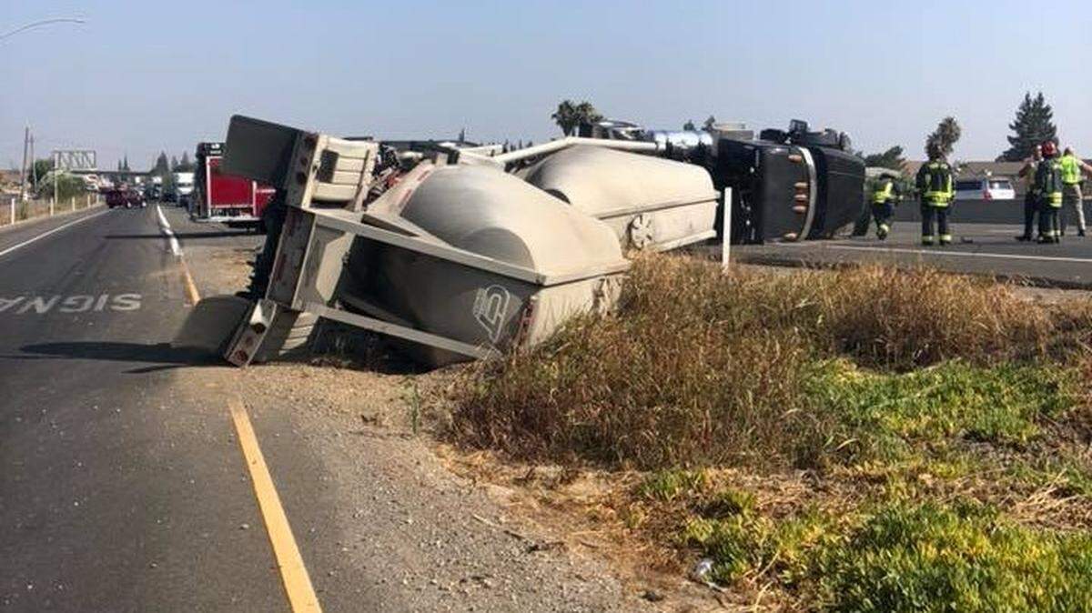 A truck hauling trailers of dry cement was struck on southbound Highway 99 in Turlock on Wednesday morning. The driver who struck the truck fled the scene.