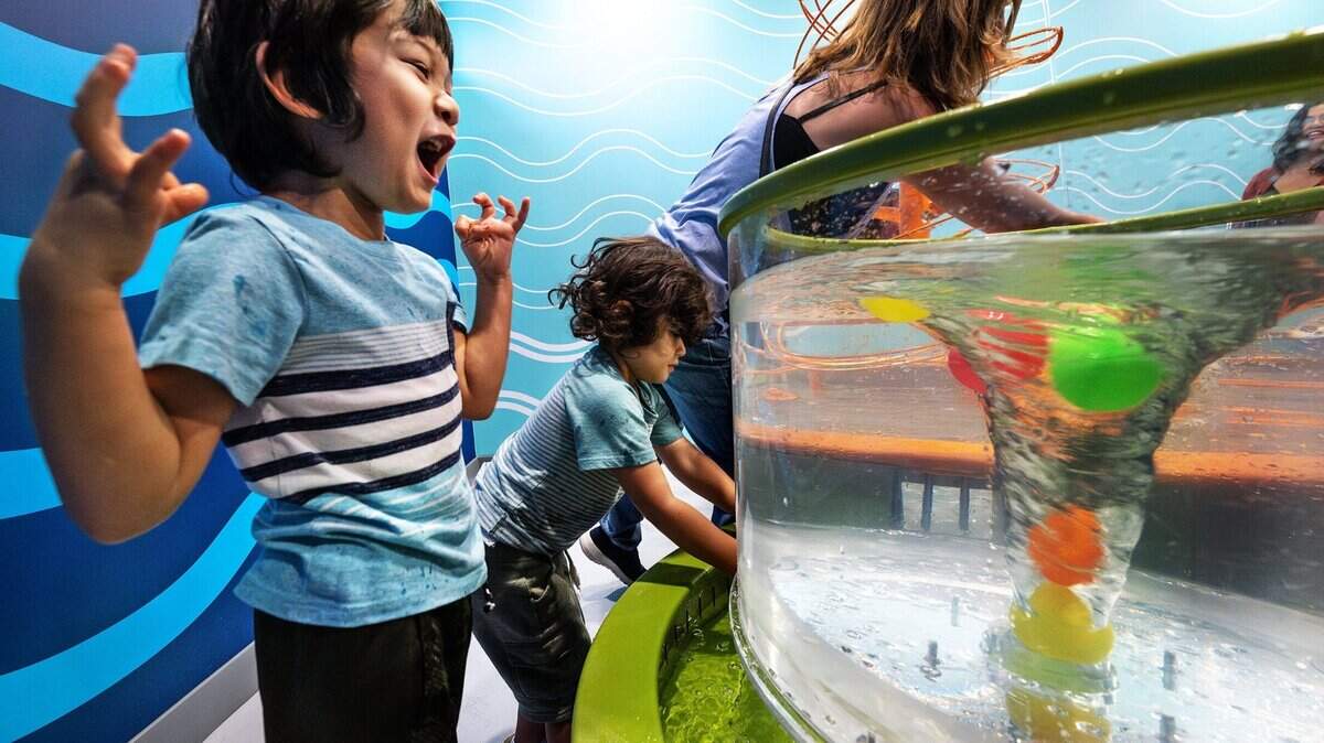Children play in the water lab at the Modesto Children’s Museum in Modesto on Sept. 28, 2023. 