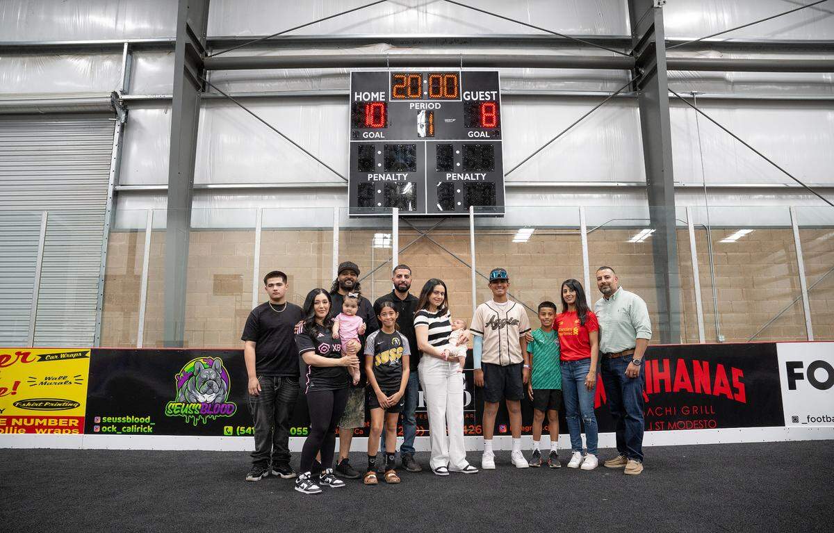 Owners with their family at the new indoor Modesto Sports Center in Modesto, Wednesday, June 4, 2025.