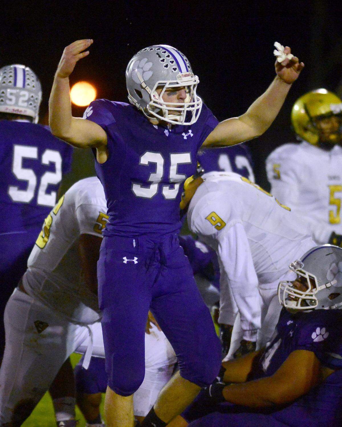 Denair defender Scott Badal (35) celebrates a stop during the CIF Division 7-AA championship game between Denair and Santee at Denair High School in Denair California on December 1, 2018.