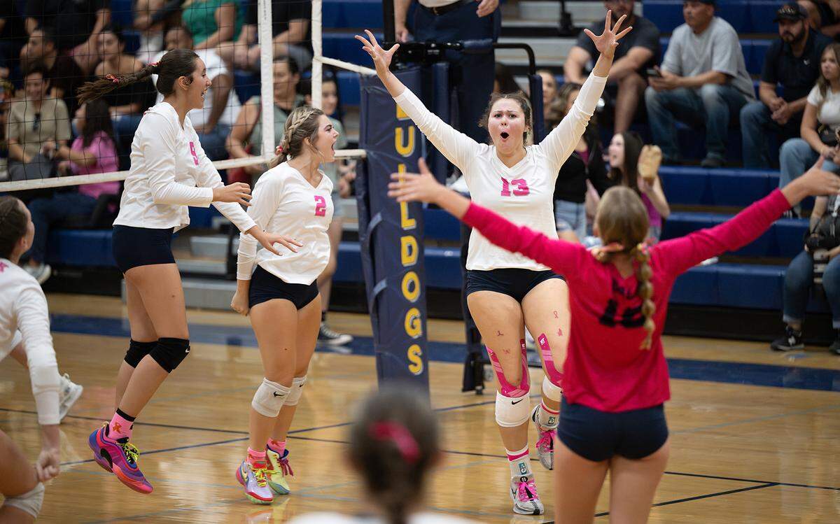 Turlock’s Madison Rice (13) celebrates with her teammates during the Central California Athletic League match with Pitman at Turlock High School in Turlock, Calif., Tuesday Oct. 8, 2024.