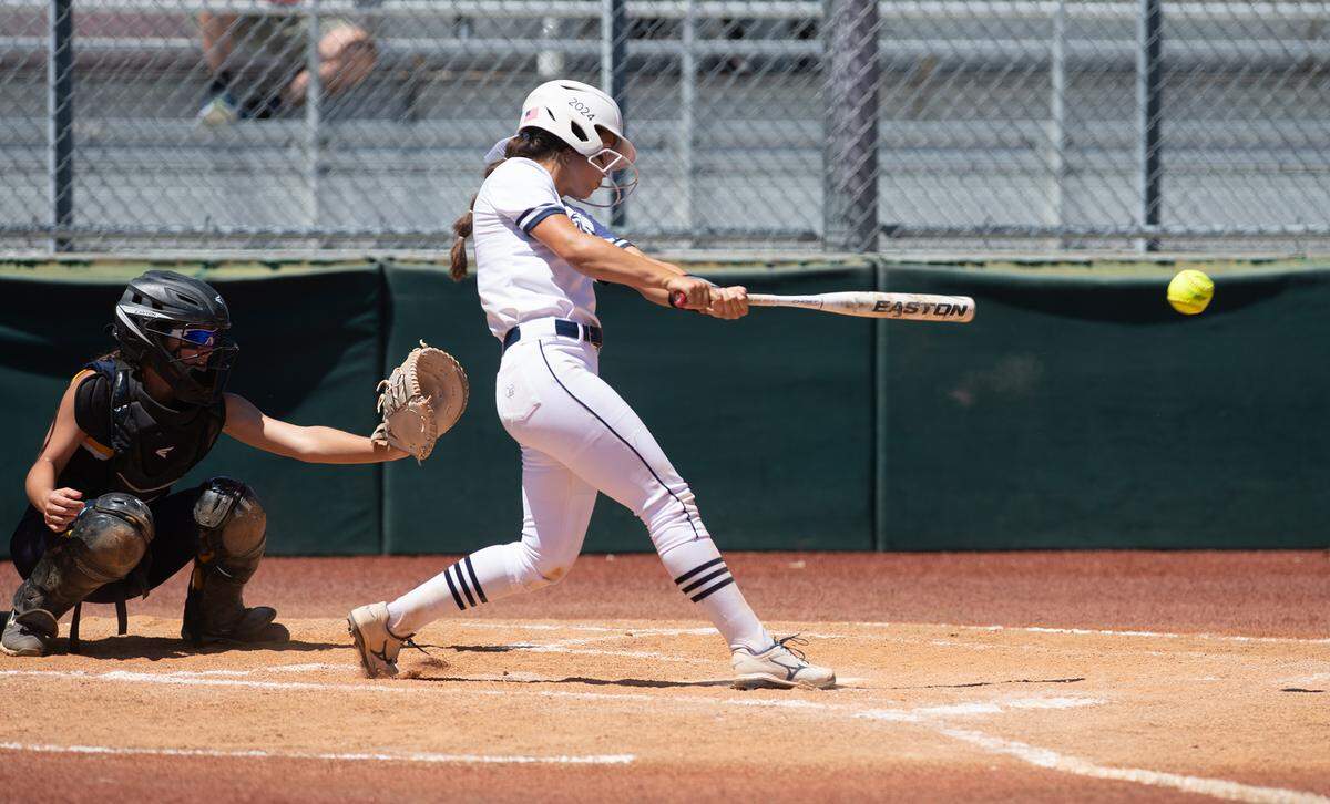 Stone Ridge Christian’s Cali Cole connects on a pitch during the Sac-Joaquin Section Softball Division VII championship game with Big Valley Christian at Delta College in Stockton, Calif., on Saturday, May 21, 2022. Big Valley Christian won the game 5-3.
