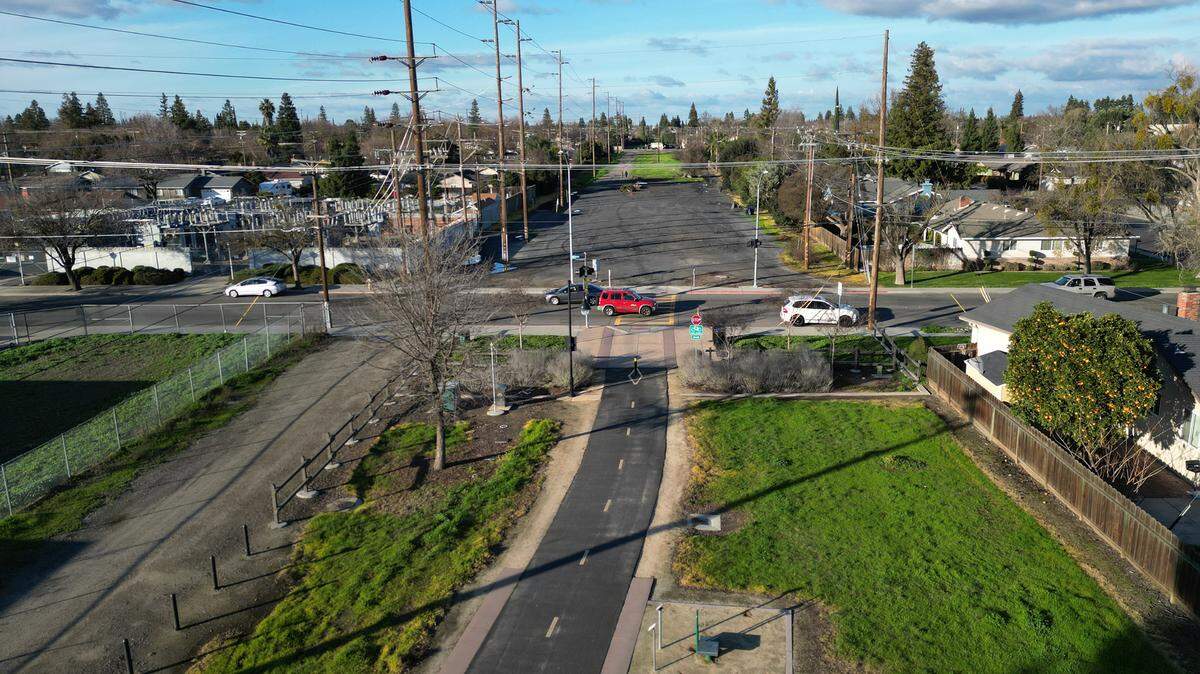 The city expects construction to start this summer on an extension of the Virginia Corridor Trial in Modesto, Calif. Phase seven will extend the corridor roughly a half mile from where it now ends at Woodrow Avenue to Union Avenue. The phase includes a pedestrian bridge spanning Standiford Avenue. Seen here looking north from Woodrow Avenue Tuesday, Jan. 23, 2024.