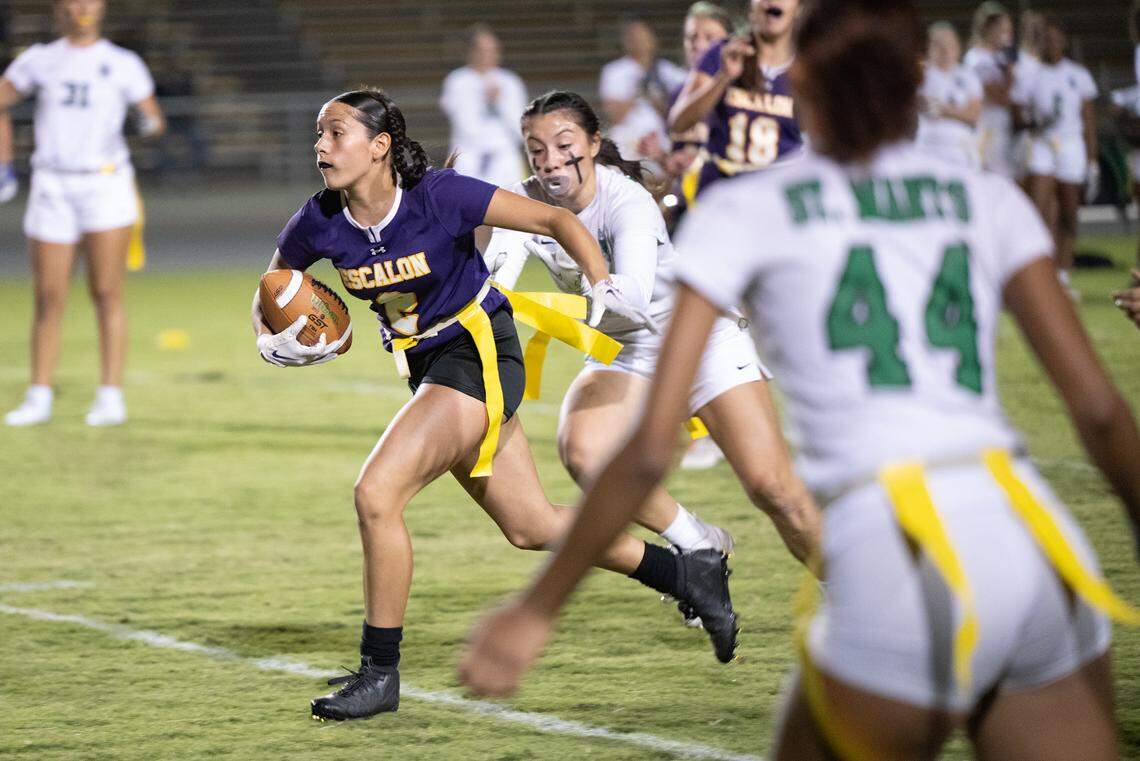 Escalon’s Jasmine Barron runs the ball after a catch duirng the CIF Sac-Joaquin Section Division II semifinal playoff game with St. Mary’s in Escalon, Calif., Wednesday, Nov. 1, 2023. St. Mary’s won the game 12-6.