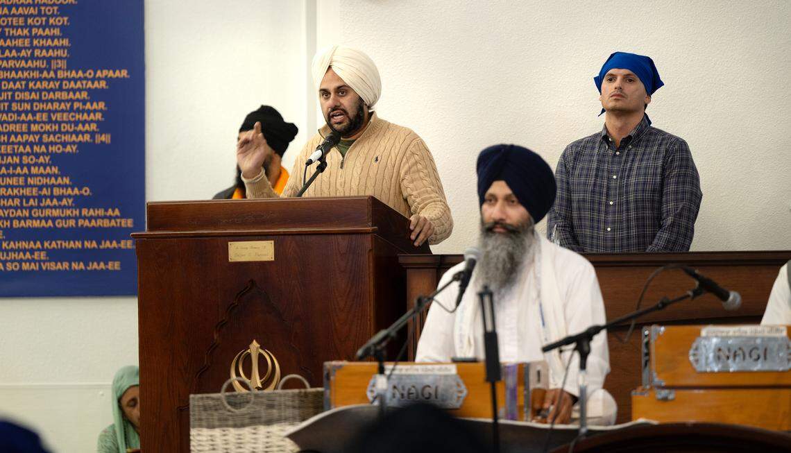 Stanislaus County Board of Supervisors Chairman Mani Grewal, left, and supervisor Chance Condit, right, present a proclamation to recognize marchers from the The Fearless for Justice March at the Gurdwara Sikh Temple in Ceres, Thursday, Oct. 24, 2024. The 350-mile march, organized by the Jakara Movement, advocates for recognition of the 1984 Sikh killings and anti-Sikh violence in India as a genocide. The march culminates in Sacramento on Nov.1.