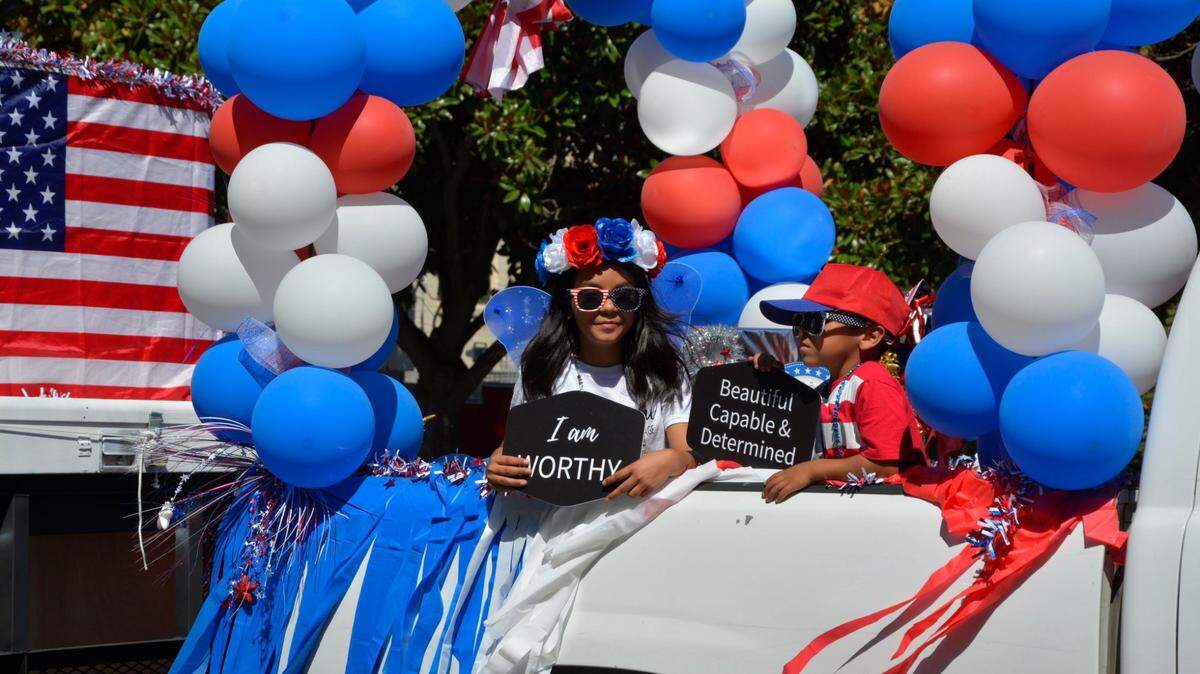 Participants ride in the 2021 Modesto Independence Day Parade.