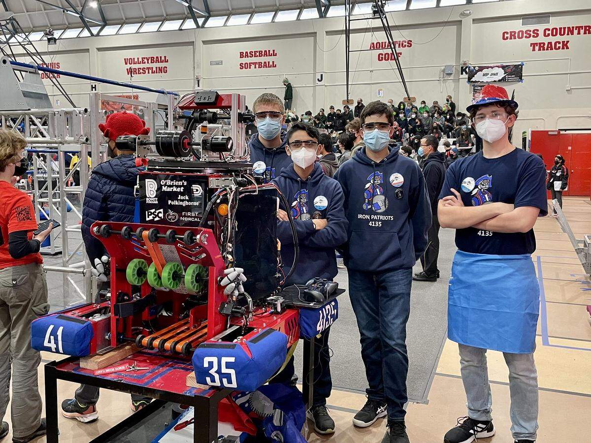 Iron Patriots drive team members Lucas Middleton, Adrian Fuentes, Matthew Davis and Daniel Melendez queue for a match.