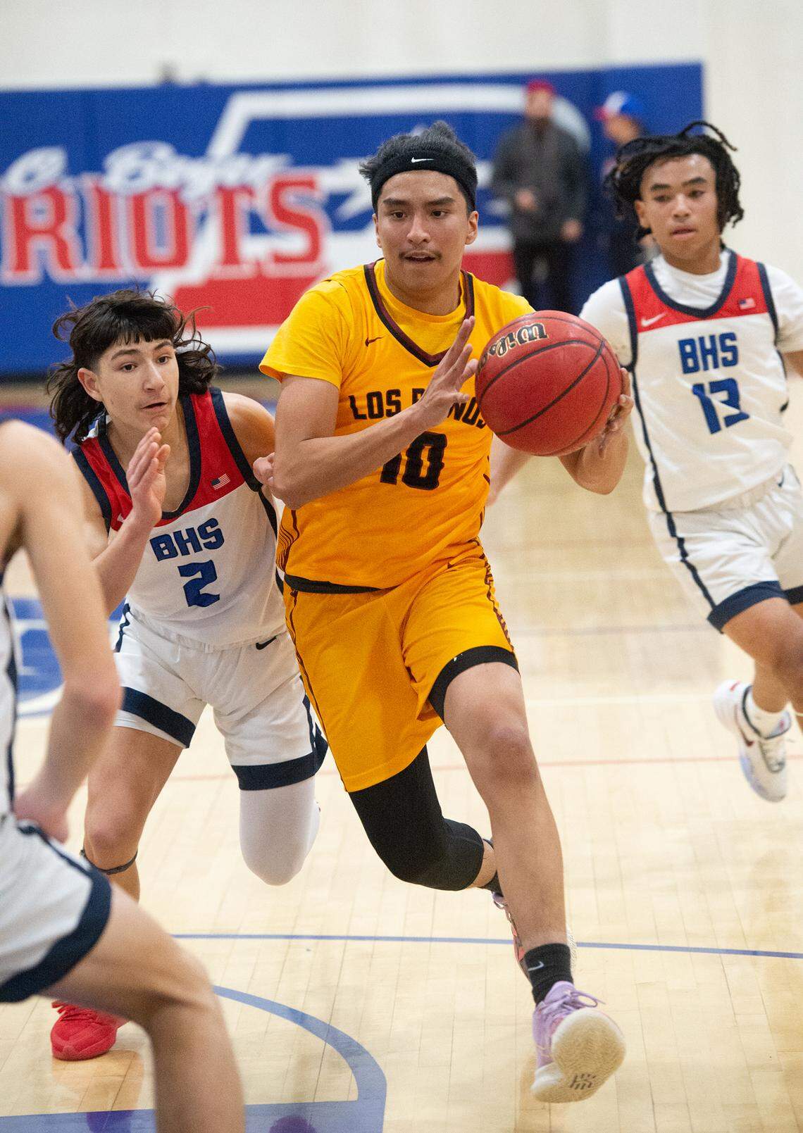 Los Banos’ Angel Resendiz attacks the basket during the Western Athletic Conference game with Beyer at Beyer High School in Modesto, Calif., Wednesday, Jan. 4, 2023.