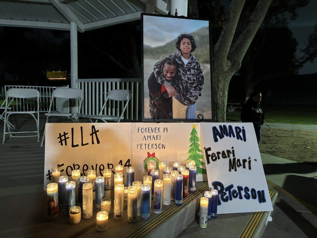 A memorial sits on stage at a vigil in Ceres for homicide victim Amari Peterson of Modesto on Tuesday, Dec. 9, 2025.