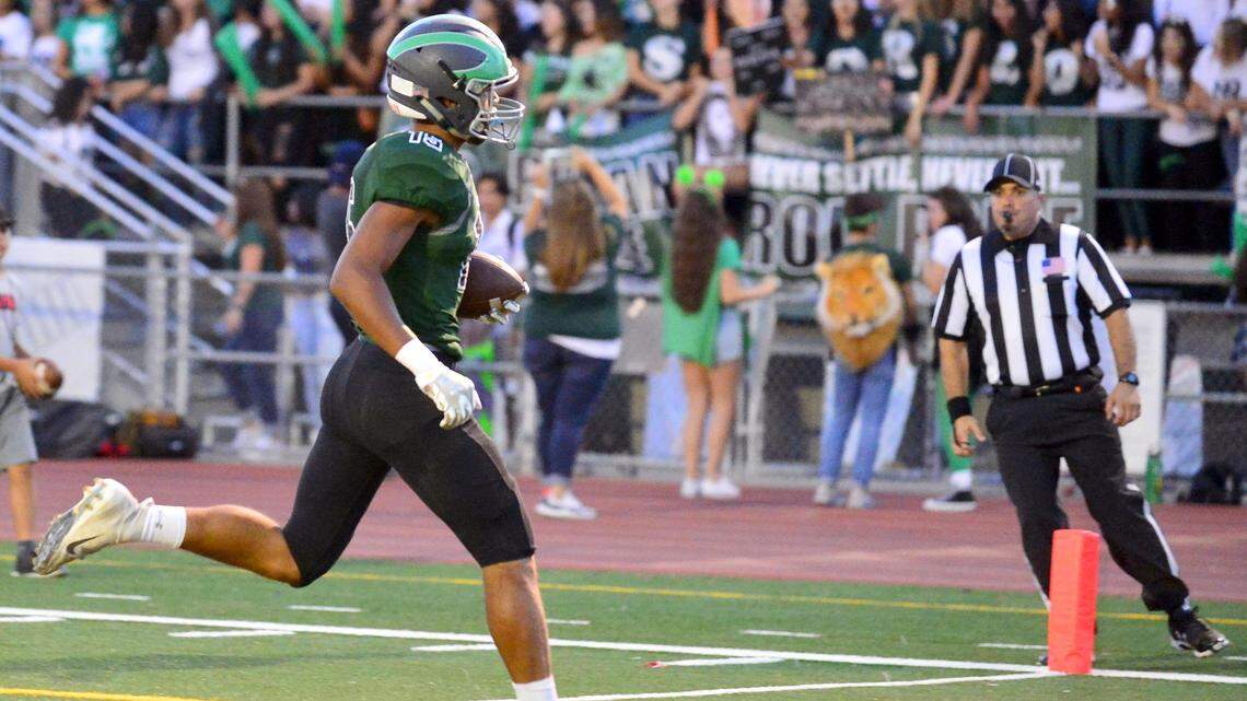 Pitman’s Payton Bass steps into the end zone for a touchdown during a game between Pitman and Summerville High School at Turlock High School in Turlock CA on September 14, 2018.

