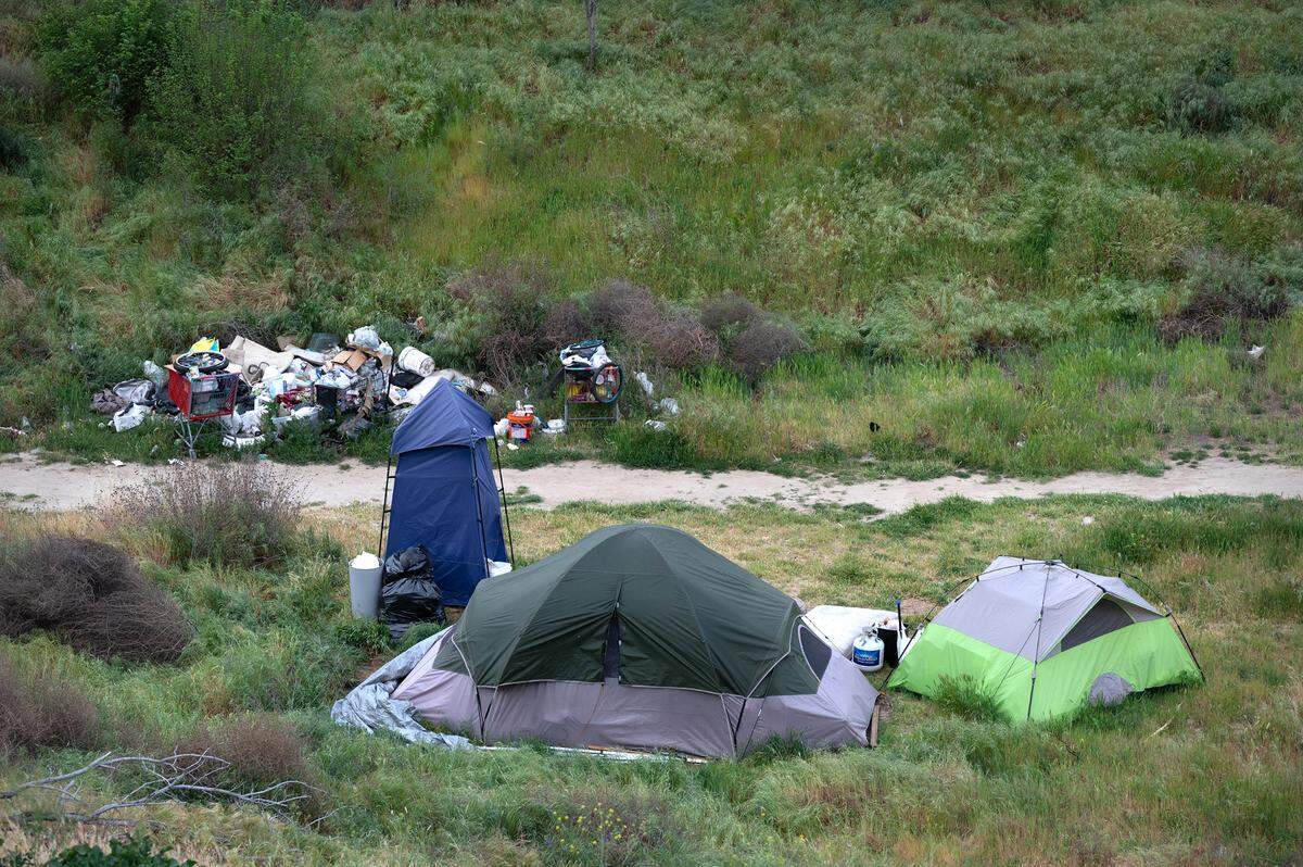 A tent camp is set up near the Modesto Junior College West Campus in March 2022.