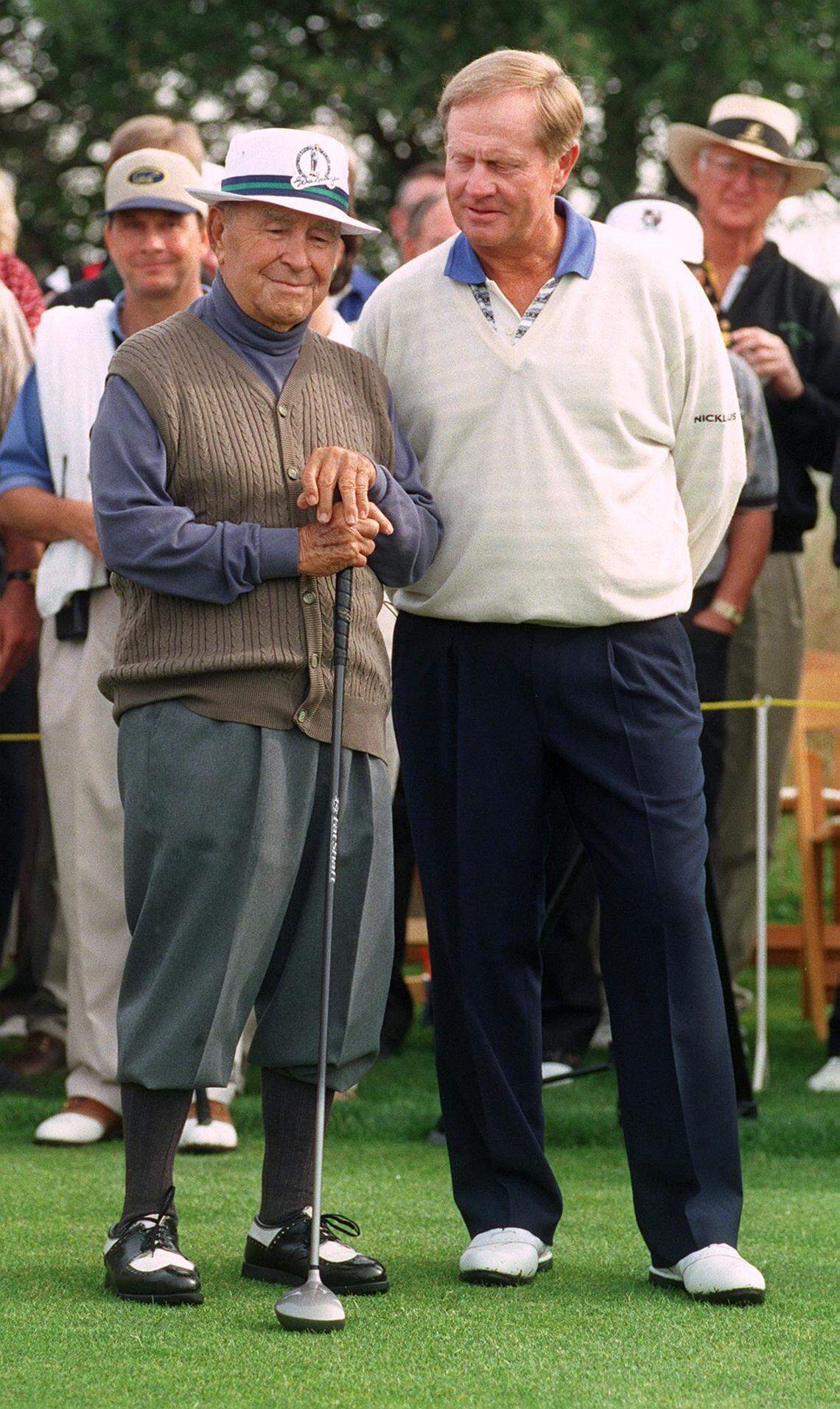 Jack Nicklaus gives Gene Sarazen an admiring look on the first tee at the offical opening of Diablo Grande’s Legends West golf course in Patterson on Thursday. Legends West is the only course in the world bearing the design signatures of Nicklaus and Sarazen, who have won major tournaments spanning from 1922 to 1986. Two years ago, they opened Diablo’s Grande’s Ranch course the same way. - golf