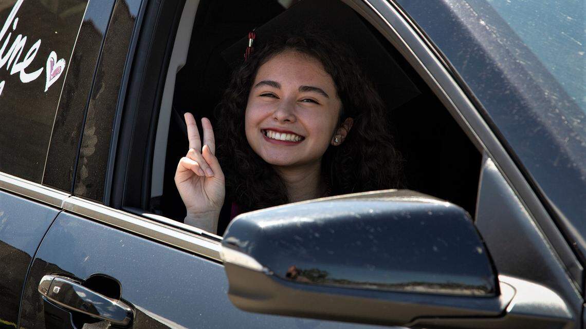 Modesto High School 2020 graduate Jacqueline Sandoval is all smiles on Friday, May 29, 2020, at the grad parade at the school. Modesto City Schools says in-person graduation ceremonies are back this May.