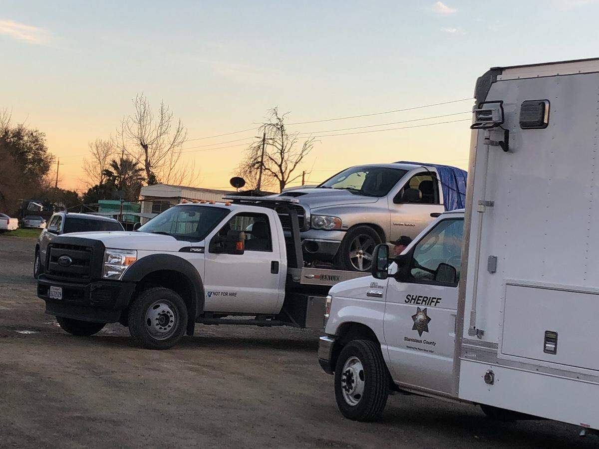The vehicle believed to be driven by the shooting suspect in the death of a Newman Police Department corporate is towed away from Martins Mobile Court in the 26000 block of River Road in Newman, California, on Wednesday, Dec. 27, 2018.