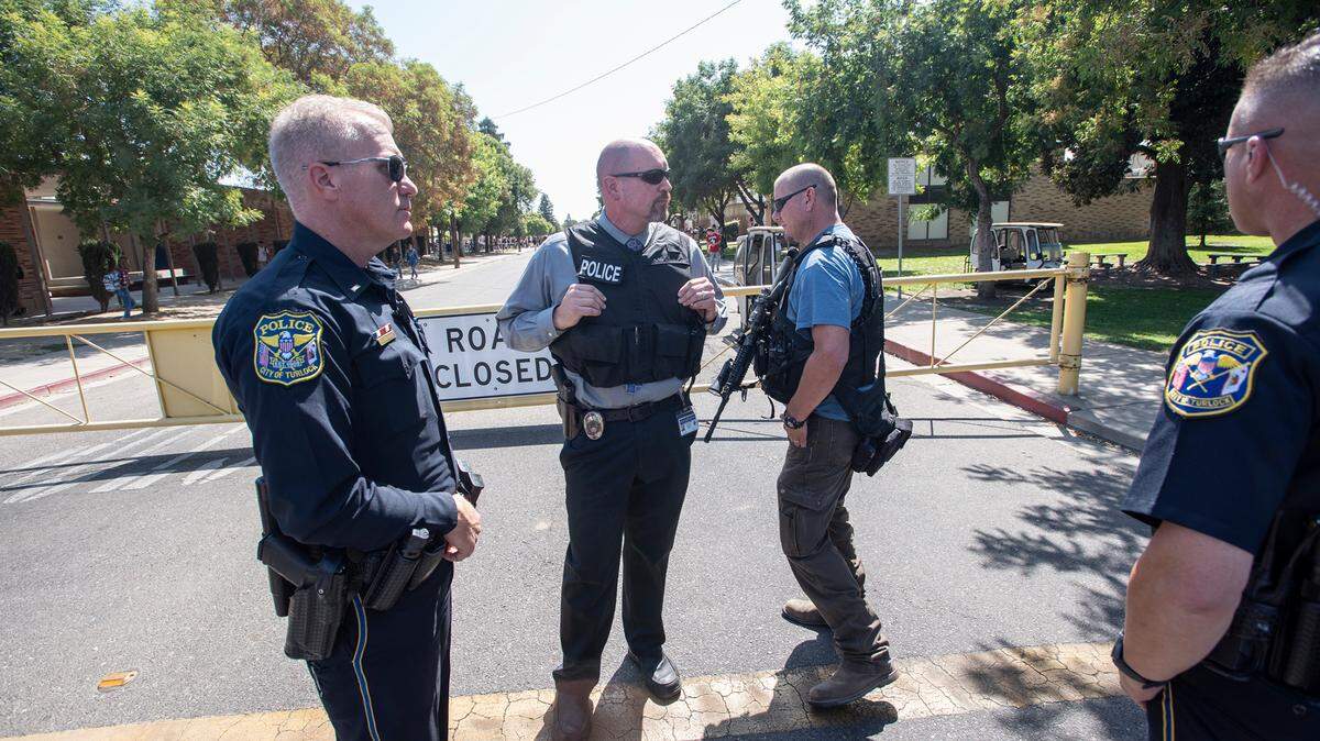 Turlock Police respond to a report of an active shooter at Turlock High School last year. Authorities cleared the school and found no one with a gun and that someone may have used a school radio make a false report.