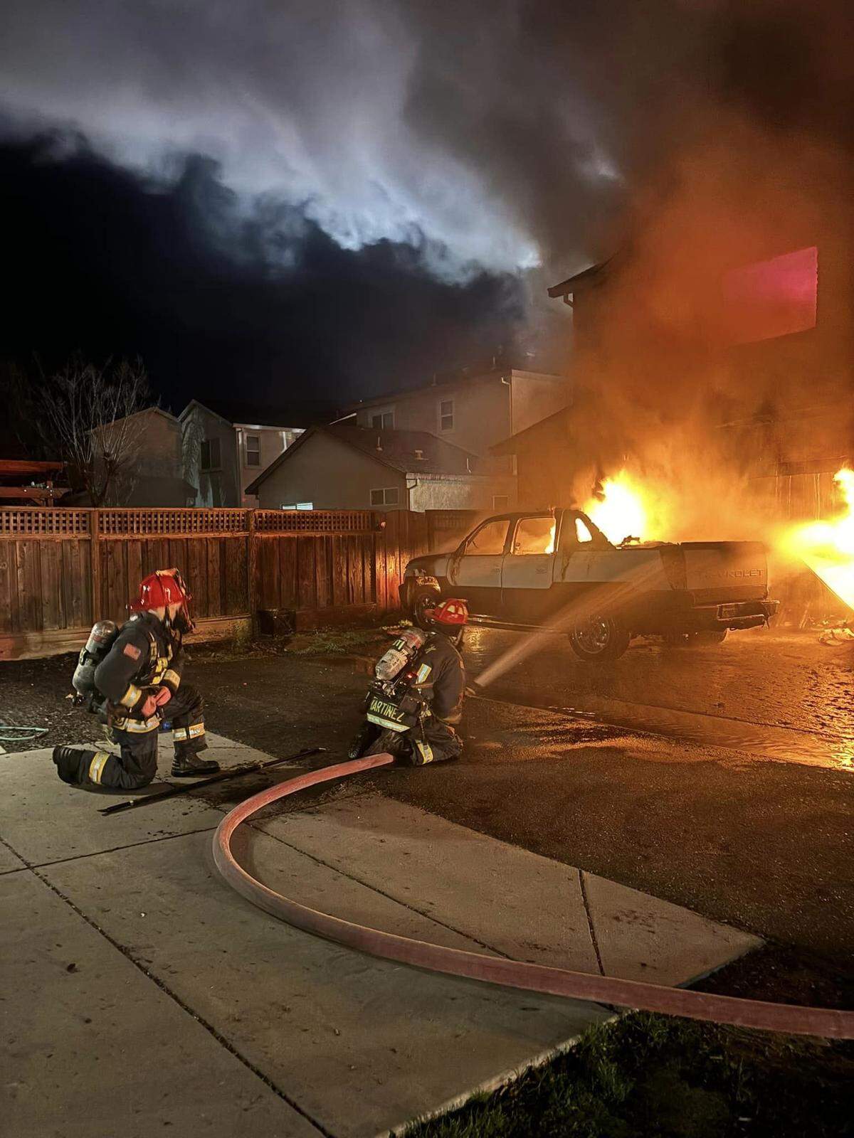 Firefighters respond to a structure fire at a single-family home on the 4100 block of Ivory Lane in Turlock on Tuesday, Jan. 9, 2024.