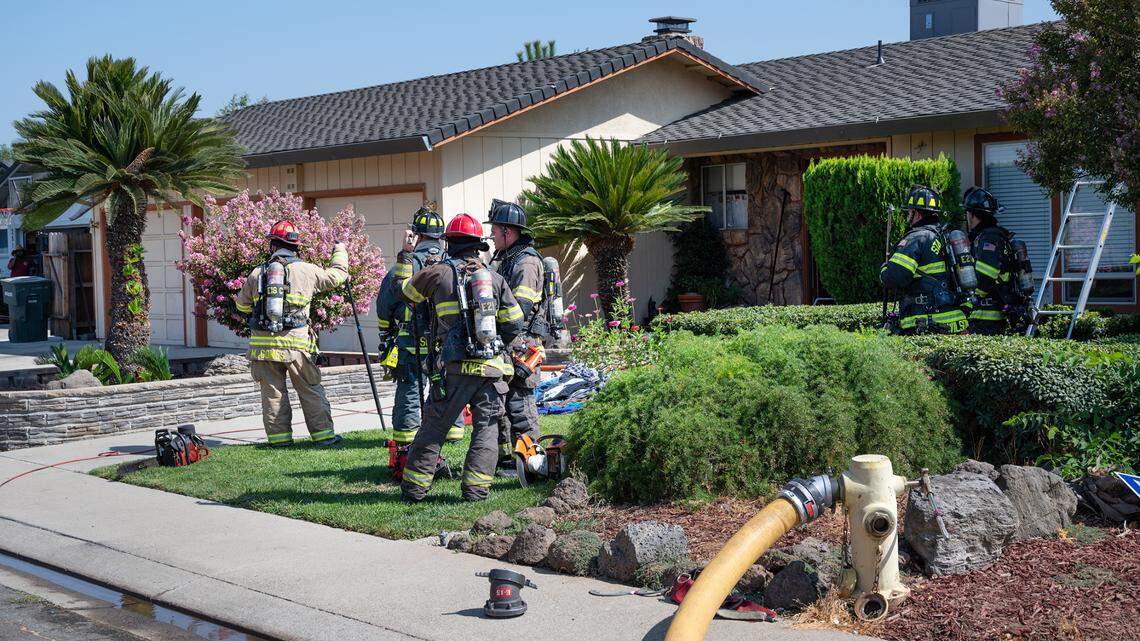 Firefighters quickly put out an attic fire at a home on Douglas Drive in Ceres, Calif., on Wednesday, Aug. 25, 2021.