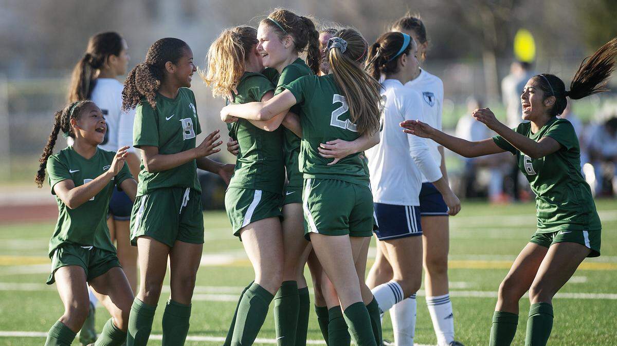 Pitman players celebrate their second goal during the Central California Athletic League game with Turlock in Turlock, Calif., on Wednesday, Feb. 12, 2020. Pitman won the game 2-0.