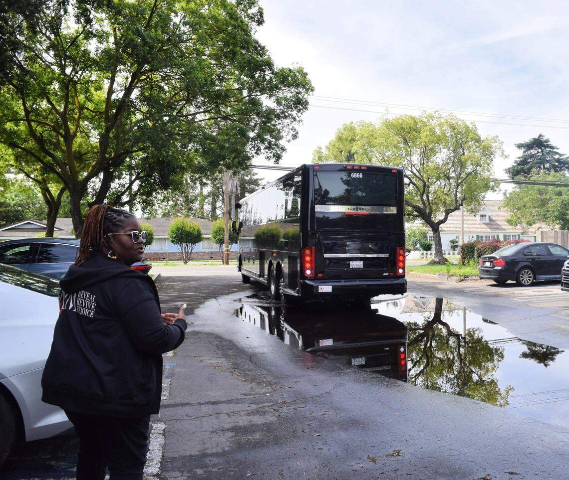 Faith in the Valley community organizer Latricia Beasley-Day watches the bus arrive on April 25, 2026, at the Church of the Brethren in Modesto.