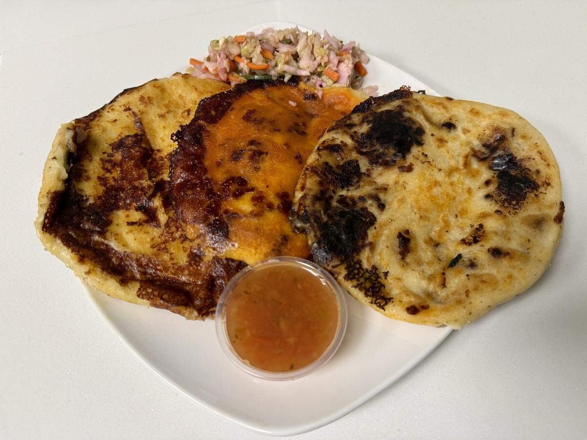 A carne asada pupusa, chorizo pupusa and garlic cheese pupusa from Pupusas Francis in Modesto, Calif.