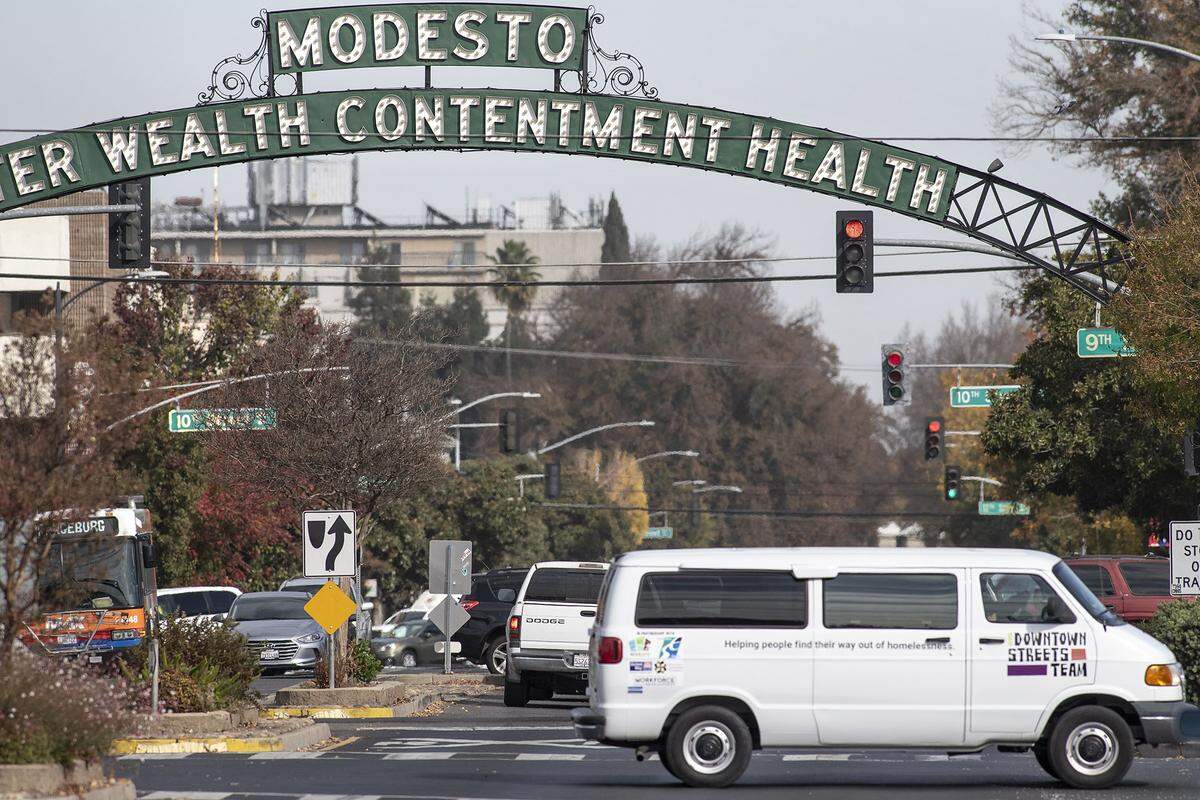 The Downtown Street Team van crosses I Street in Modesto in 2019. 