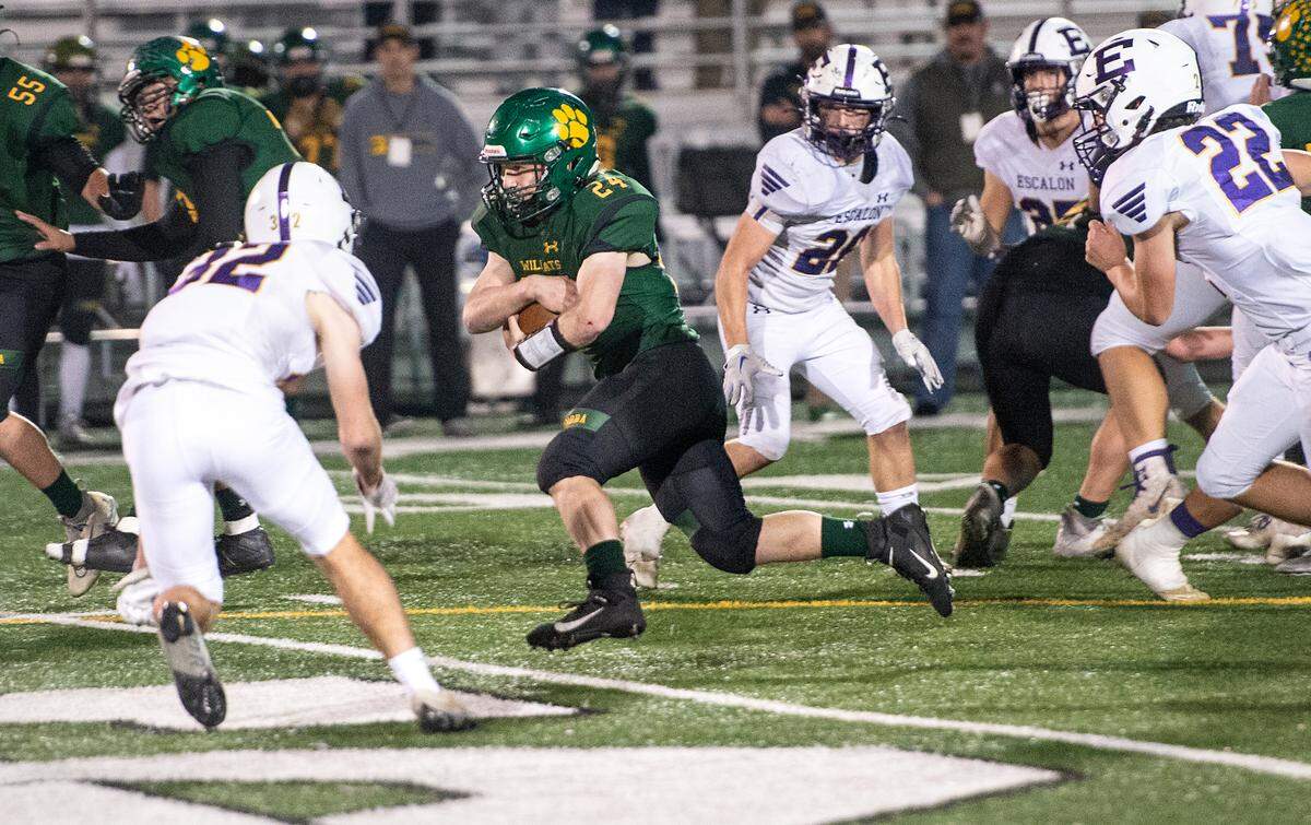 Sonora’s Audie Peeples runs the ball during the Sac-Joaquin Section Division V championship game with Escalon at St. Mary’s High School in Stockton, Calif., Saturday, Nov. 26, 2022.