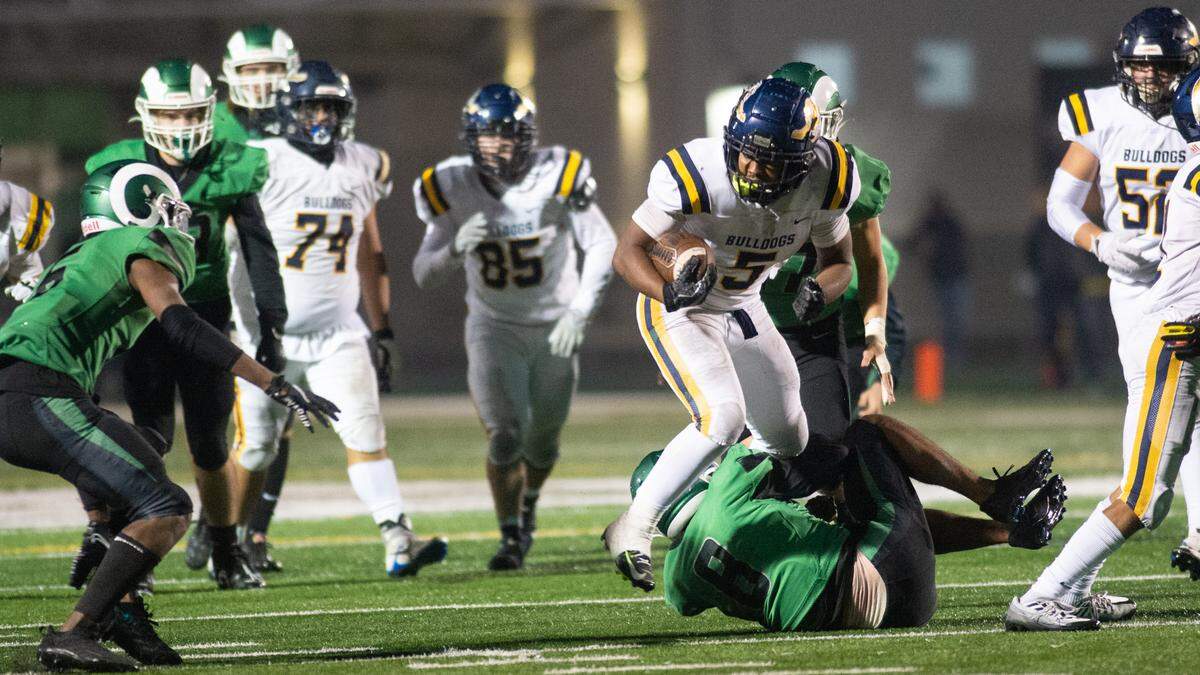 Turlock’s J.T. Foreman II runs the ball during the CIF Sac-Joaquin Section Division 1 playoff game with St. Mary’s at St. Mary’s High School in Stockton, Calif., Friday, Nov.11, 2022.