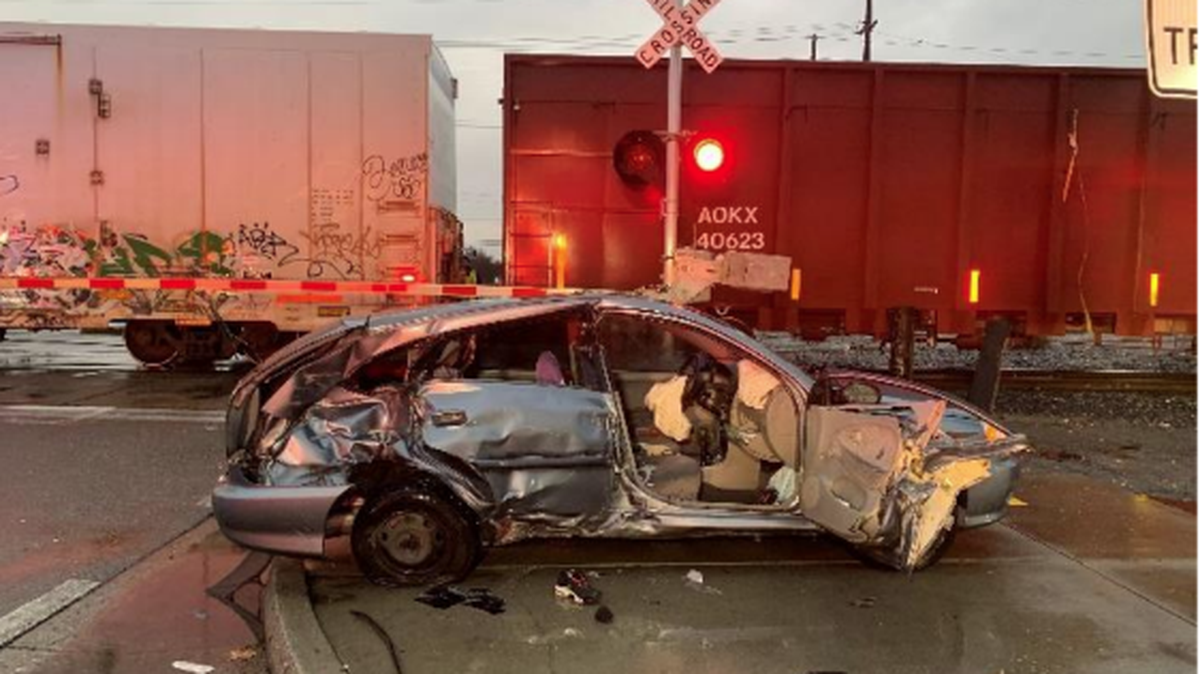 Two people were injured when their vehicle was hit by a train in downtown Modesto on Jan. 2, 2023.