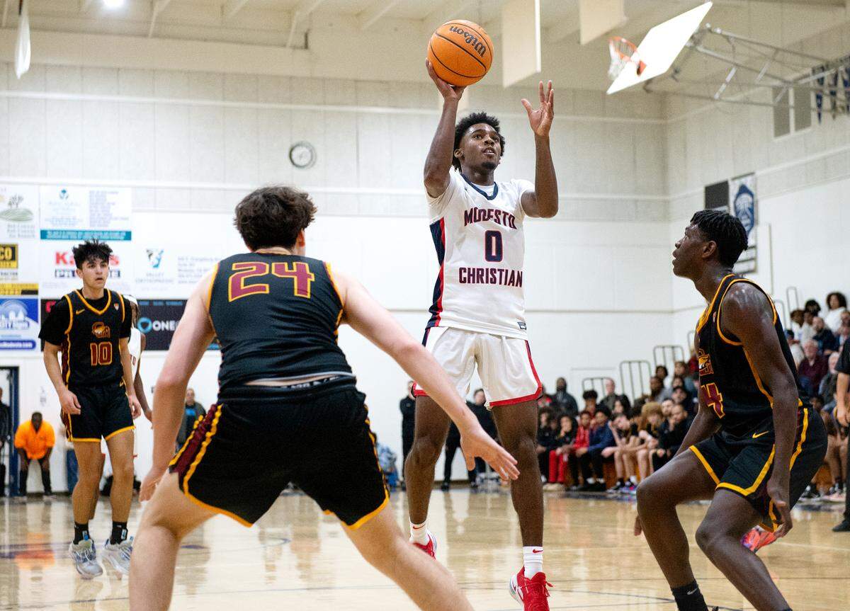 Modesto Christian’s Jalen Brown scores on a jump shot during the Modesto Christian Holiday Hoop Classic championship game with Clovis West at Modesto Christian High School in Salida, Calif., Friday, Dec. 30, 2022. MC won the game 79-55.