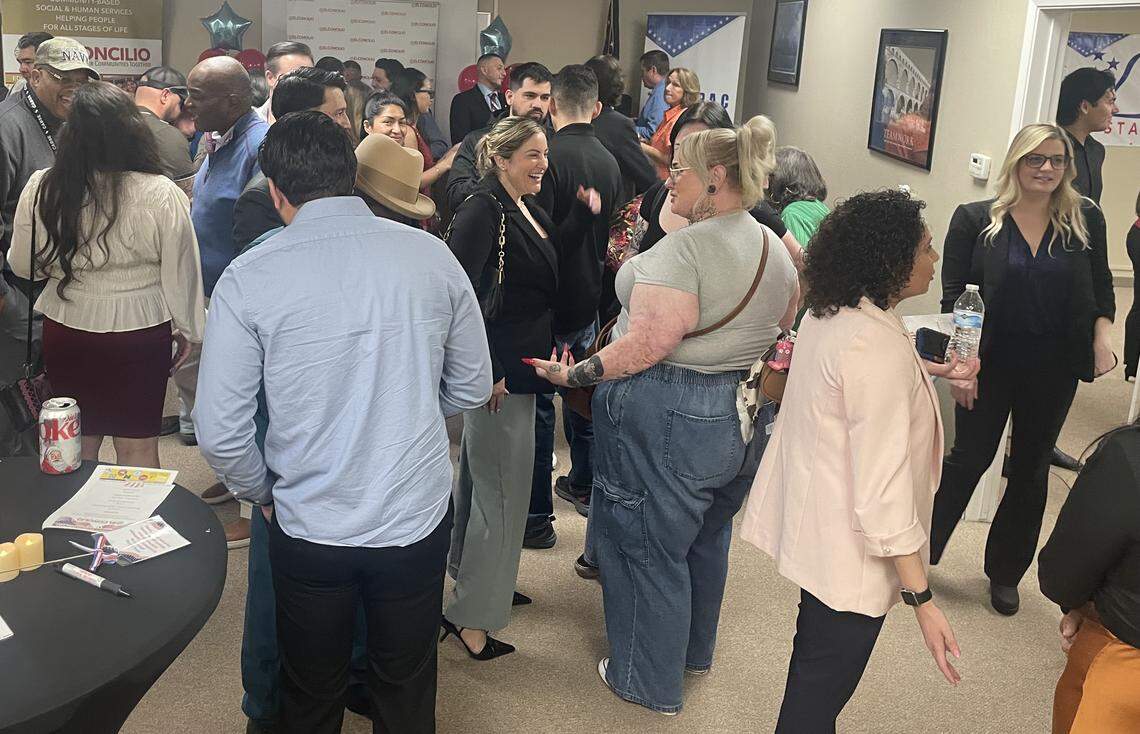 Turlock City Council candidate Kelley Coelho, center, attends the Meet Your Elected Officials evening Feb. 25 at El Concilio California’s Modesto location.