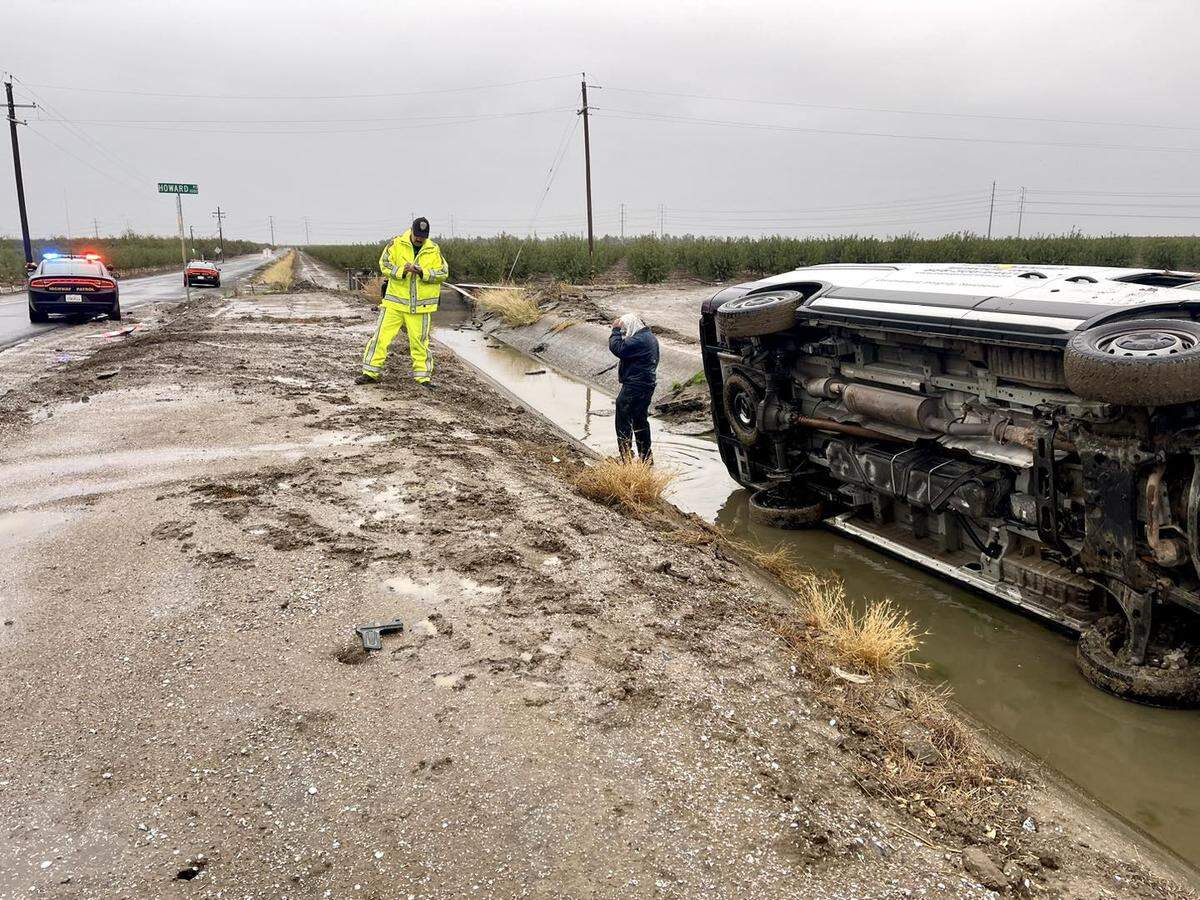 The driver of this van escaped injury when he went through the T intersection at Howard and Frank Cox roads in Westley and drove into a canal.