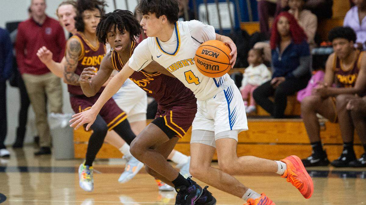 Ripon Christian’s Luke Crivello sets up a play as Edison’s Jehahn Williams defends during the Modesto Christian Holiday Hoop Classic game at Modesto Christian High School in Salida, Calif., Thursday, Dec. 29, 2022.