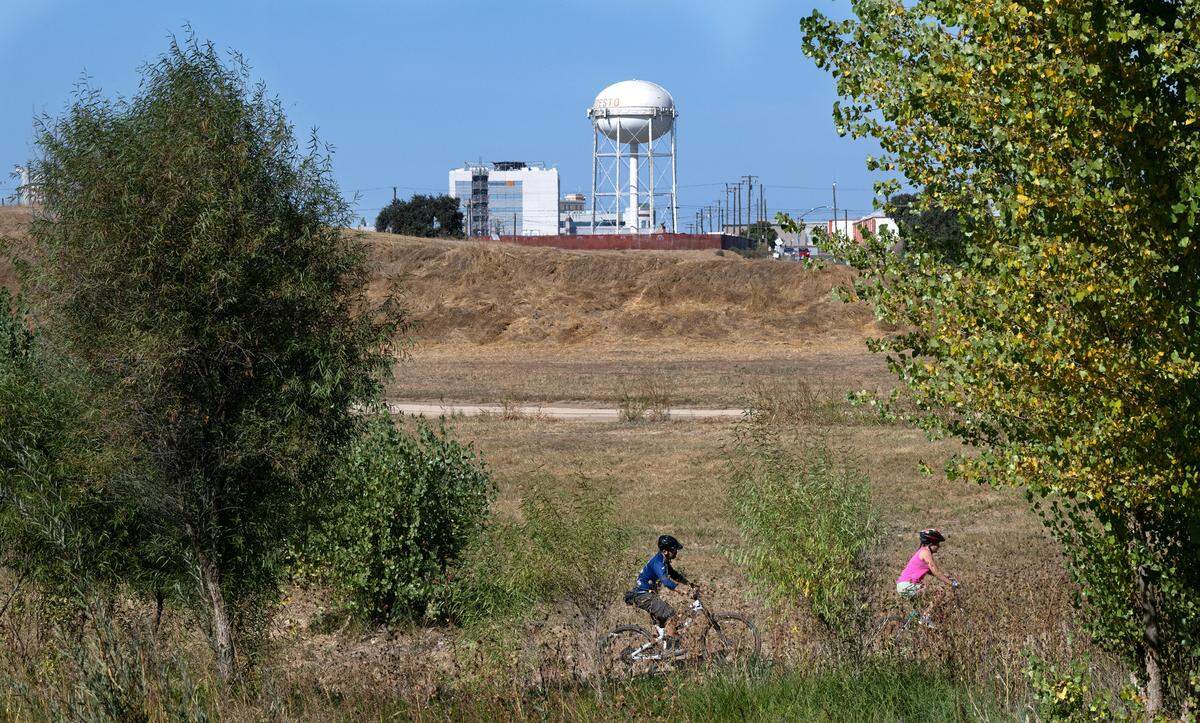 Bikers ride through Gateway Park during Modesto RecFest in Modesto, Calif., Saturday, Oct. 21, 2023.