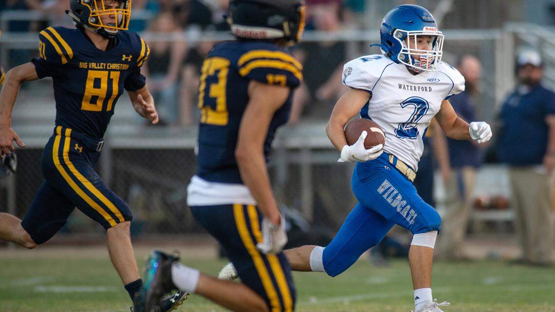 Waterford’s Caleb Hilton breaks out for a long gain during the non-league game with Big Valley Christian at Big Valley Christian High School in Modesto, Calif., on Friday, Aug. 27, 2021.