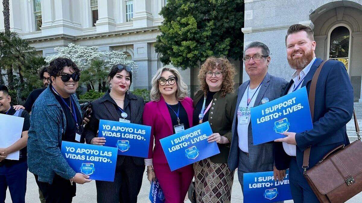 Directors of the various centers, Jaime Dorantes, Salma Torres, Katalina Zambrano, Morgan Rain, CEO John Aguirre and Roman Scanlon, gather at the LGBTQ advocacy day at the state Capitol on April 8, 2024.