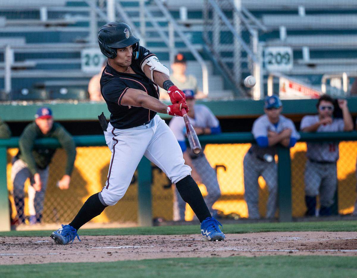 Modesto Nuts’ Harry Ford connects on a pitch during the California League game with the Stockton Ports at John Thurman Field in Modesto, Calif., on Wednesday, July 6, 2022.