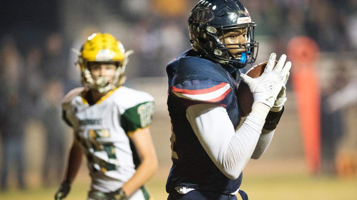 Modesto Christian’s Xavier Carlton makes a catch during the Sac-Joaquin Section Division VI playoff game with Argonaut in Modesto, Calif., Friday, Nov. 9, 2018. 