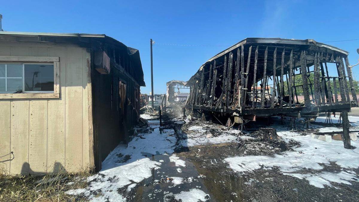 Two mobile homes suffer fire damage after a Wednesday fire in Ceres. The fire began on the porch of the trailer on the right, a resident said.