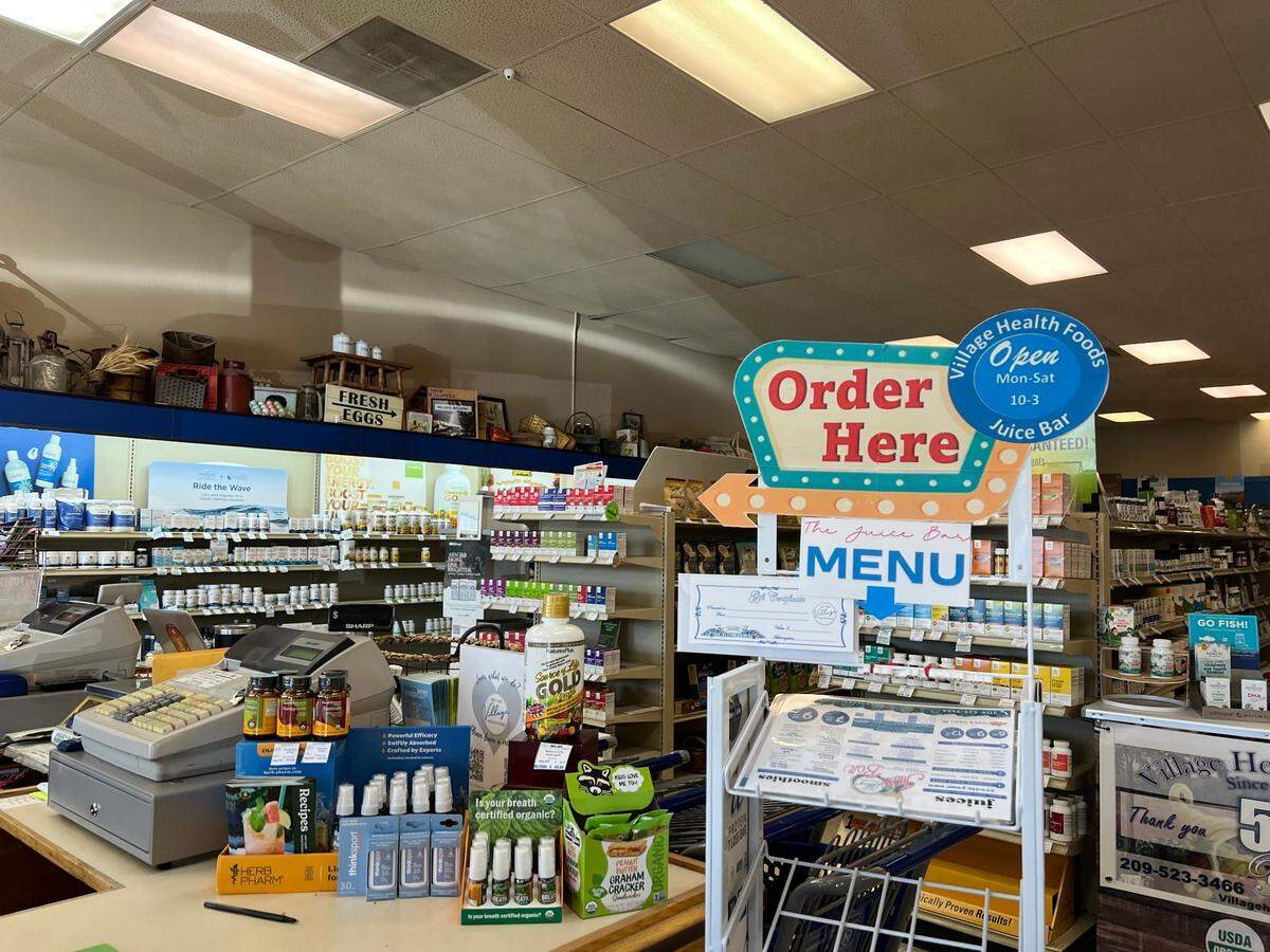 On the menu at Village Health Foods, there are organic juices, smoothies and other lunch items.